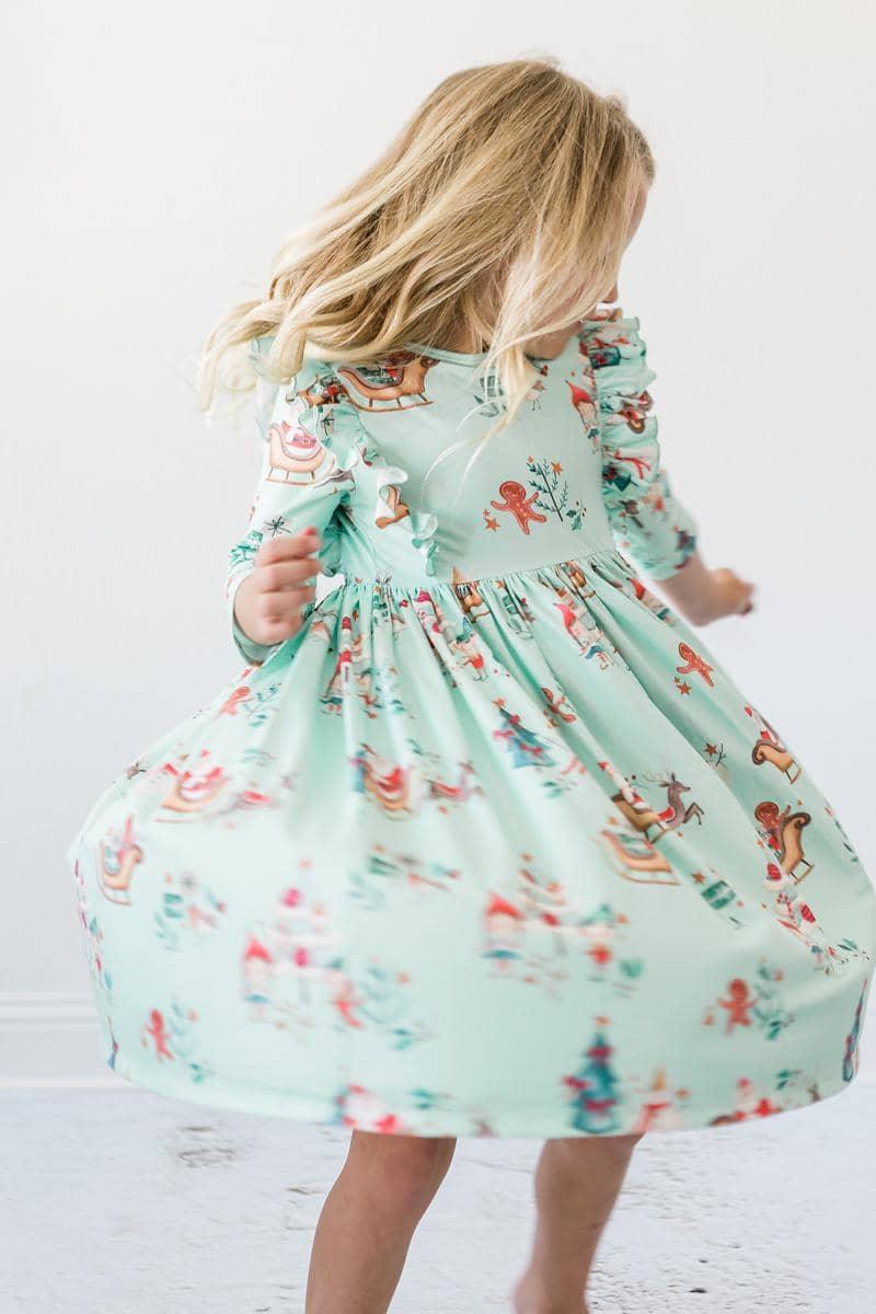Girls light blue twirl dress with 3/4 sleeves and festive ruffle details for toddlers