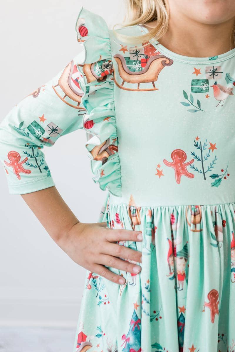 Mila & Rose girls twirl dress in light green with Christmas print and 3/4 sleeves ruffle detail