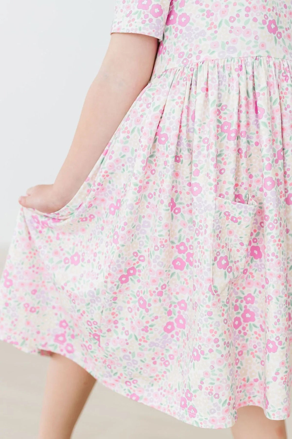 Girls pastel pink floral twirl dress with pockets short sleeve by Mila & Rose