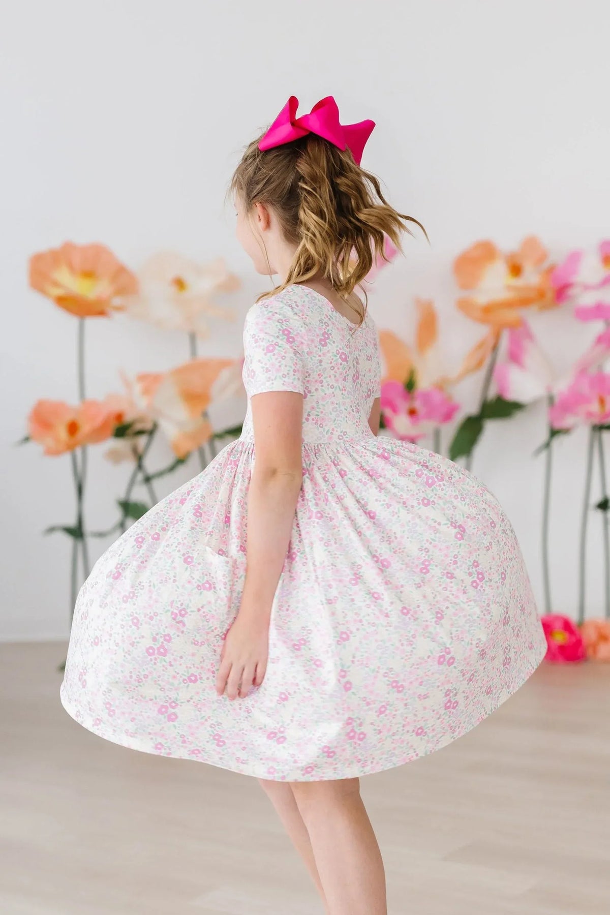 Girls pink floral twirl dress with pockets short sleeve dress for young girls by Mila & Rose