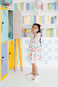 Girls white twirl pocket dress with colorful print and 3/4 sleeves for kids 