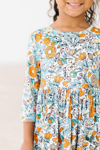 Girls vintage twirl dress by Mila & Rose with 3/4 sleeves and colorful floral bird print
