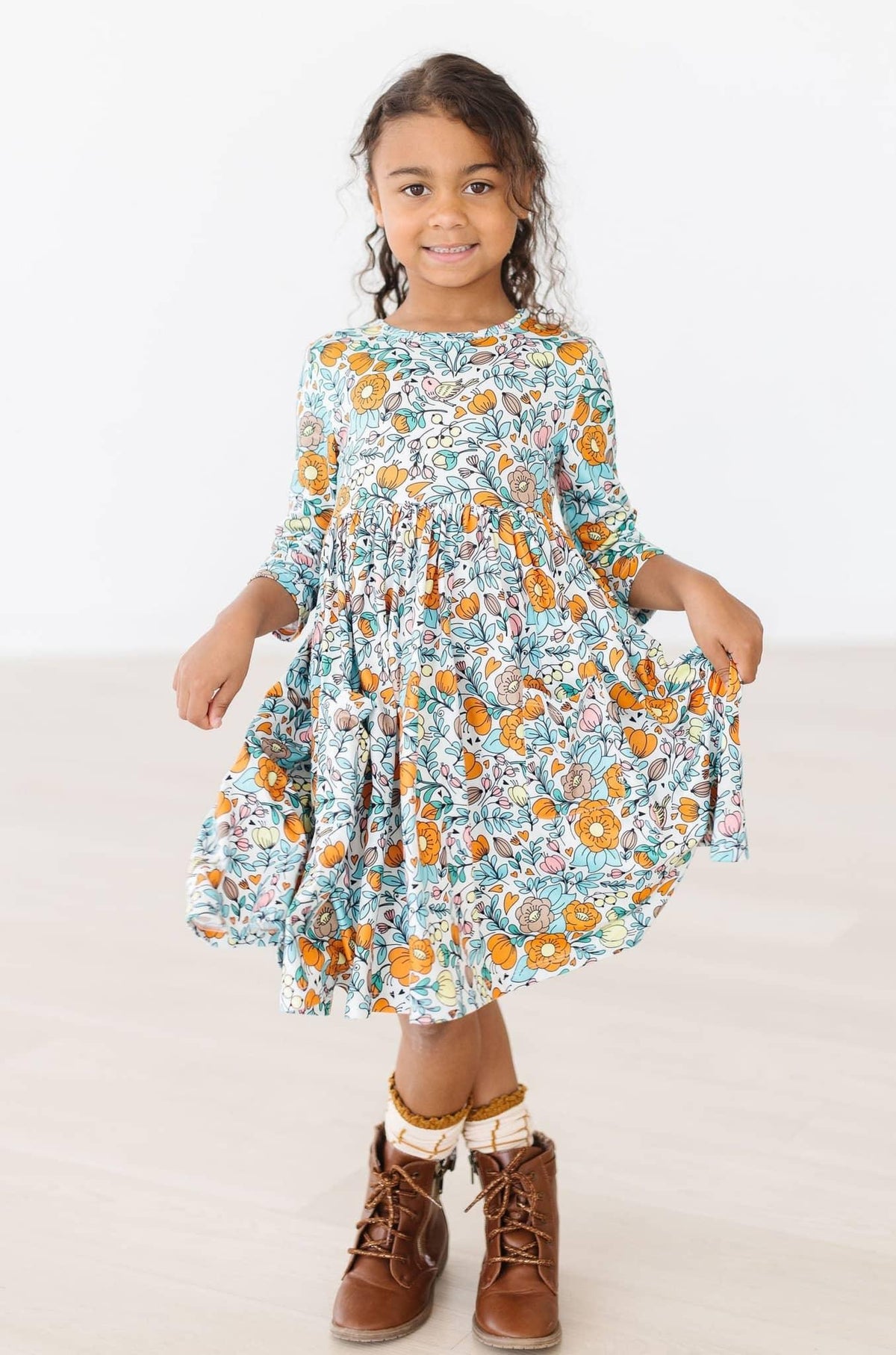 Girls vintage twirl dress in floral print with 3/4 sleeves for ages 4 to 6