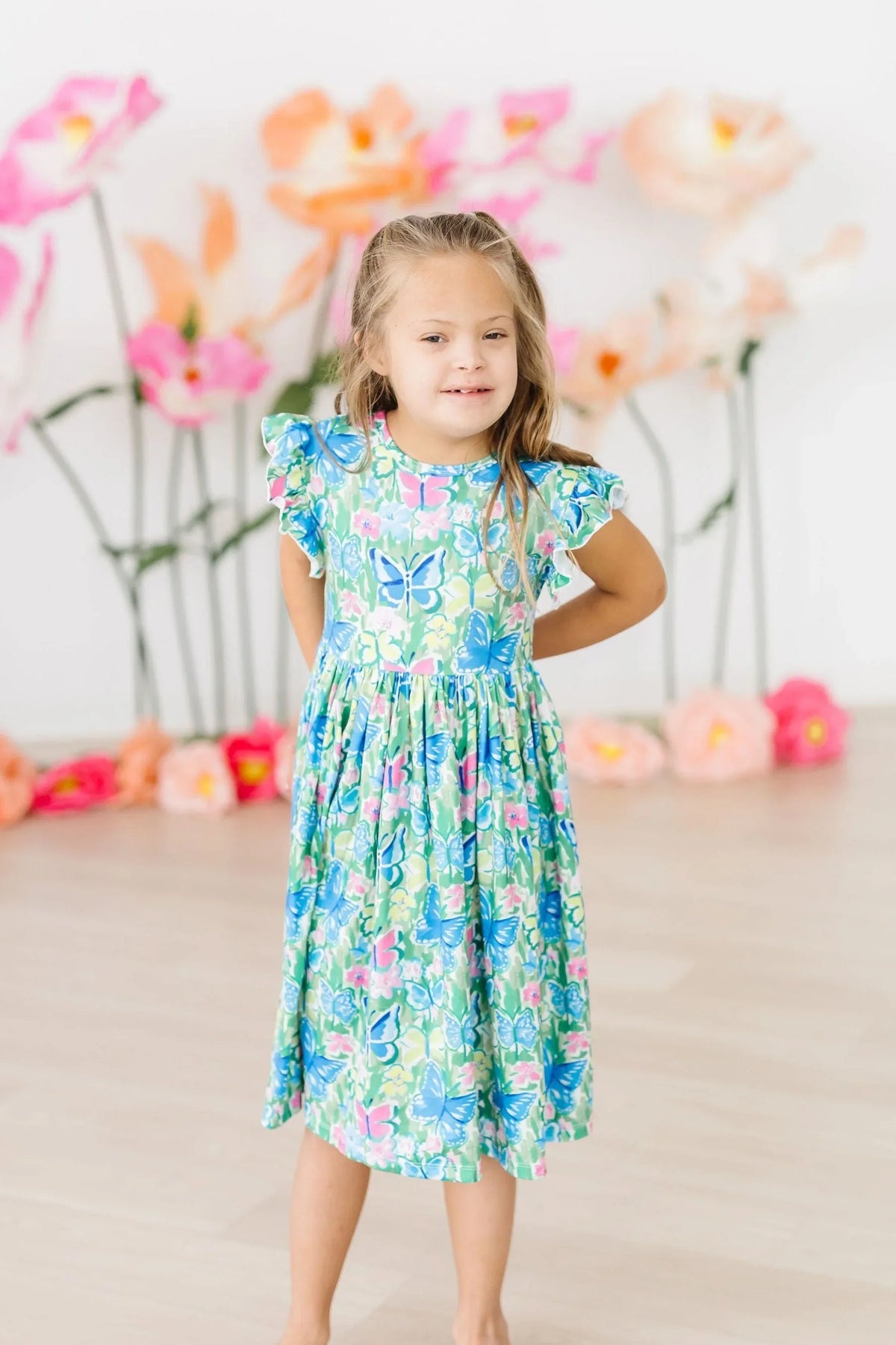 Girls watercolor butterfly dress by Mila & Rose with flutter sleeves in blue and green, toddler size
