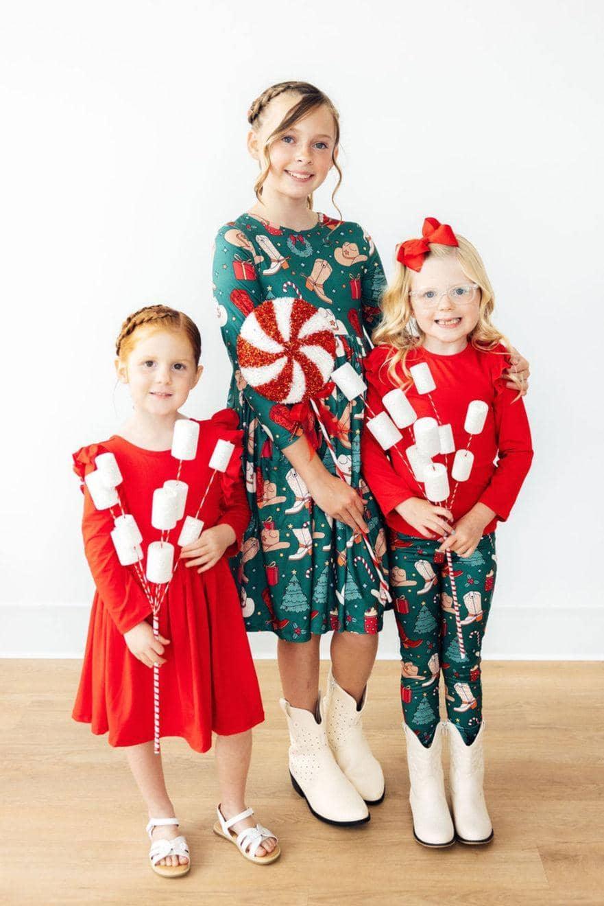 Girls green Christmas western themed twirl dress, long sleeve, size 7 and girls red long sleeve dress for toddlers