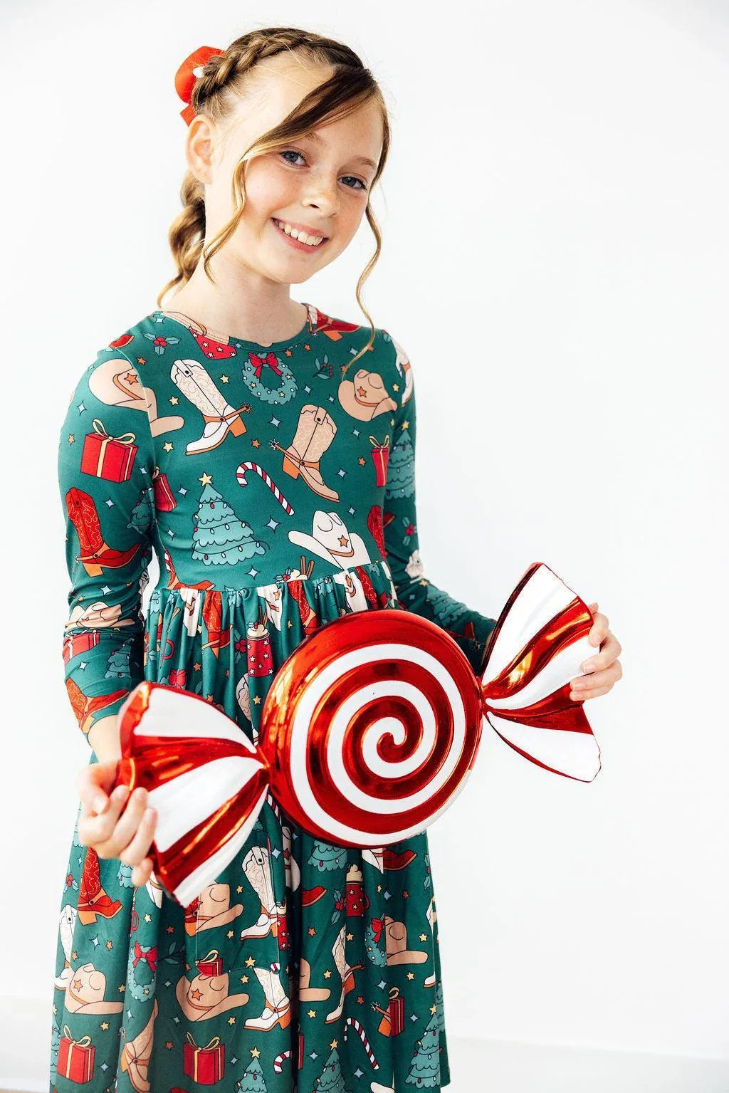 Girls green long sleeve girls western themed twirl dress with Christmas and cowboy print