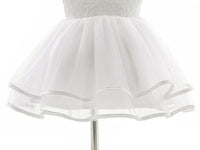 Girls white lace occasion dress for toddlers featuring a layered tulle skirt and delicate lace bodice