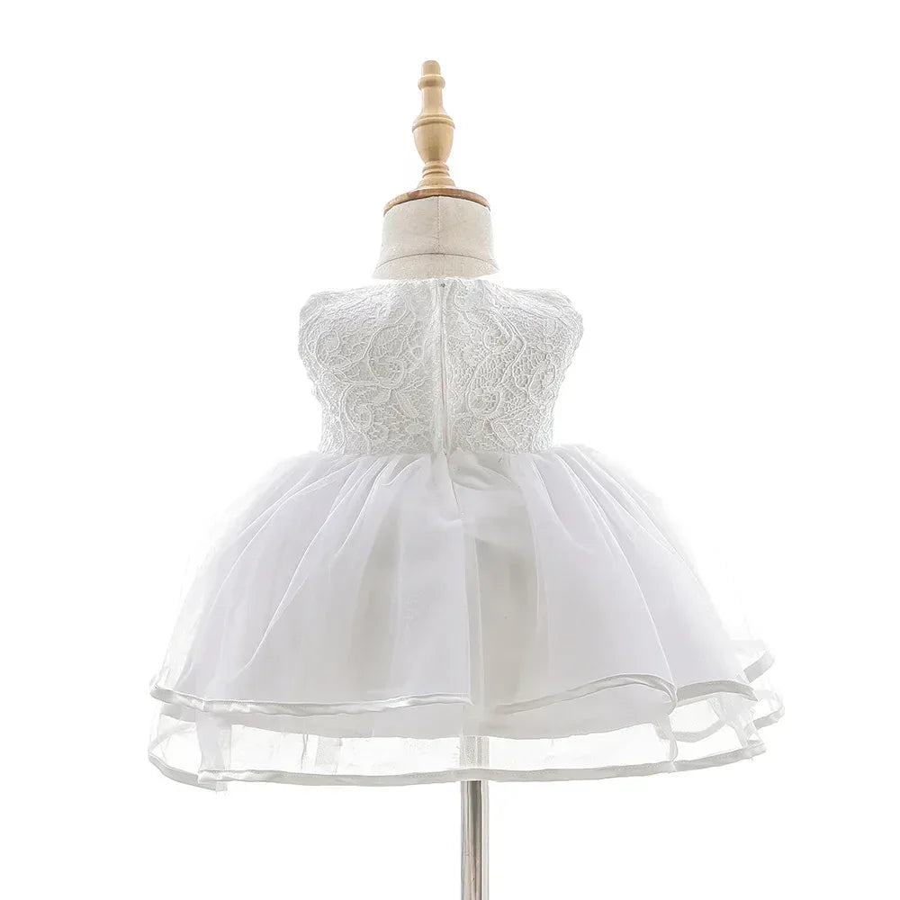 girls white lace occasion dress with sleeveless bodice and full tulle skirt for babies and kids