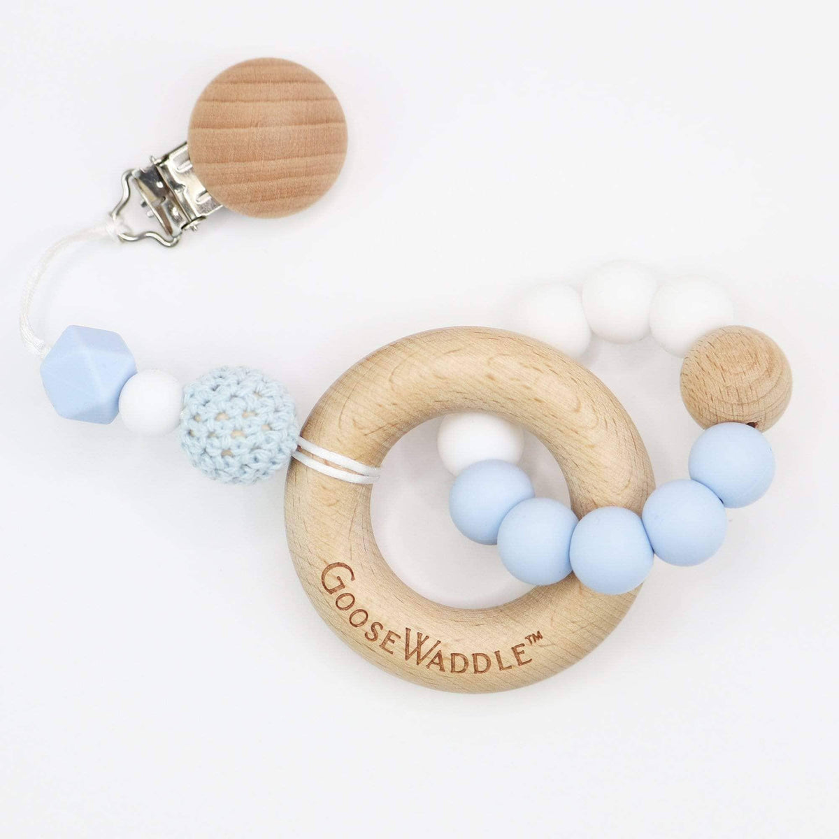 Goosewaddle baby gift set featuring light blue and white silicone beads with wooden ring teether for newborns