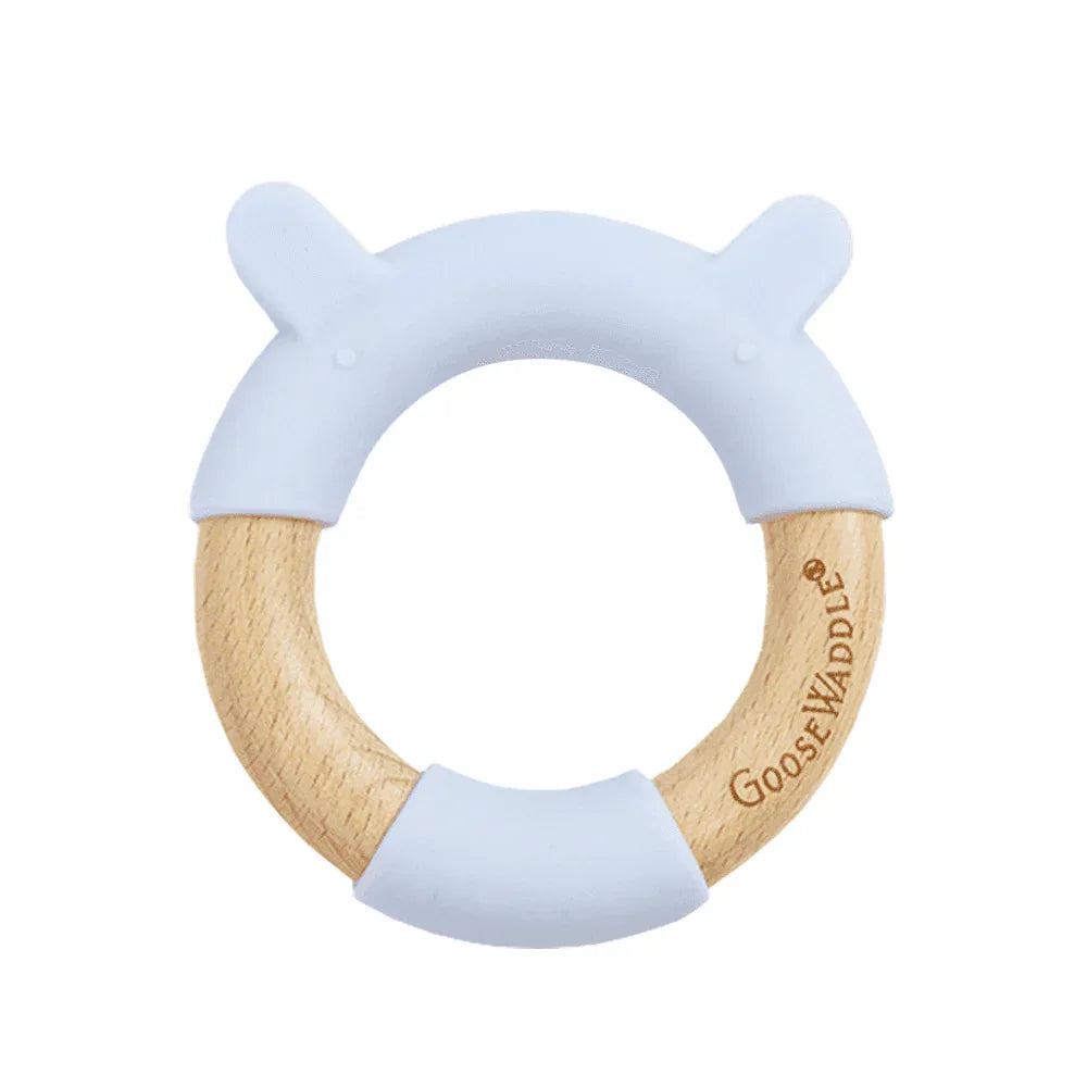 Blue bear teether made of soft blue silicone and natural wood for newborns by Goosewaddle
