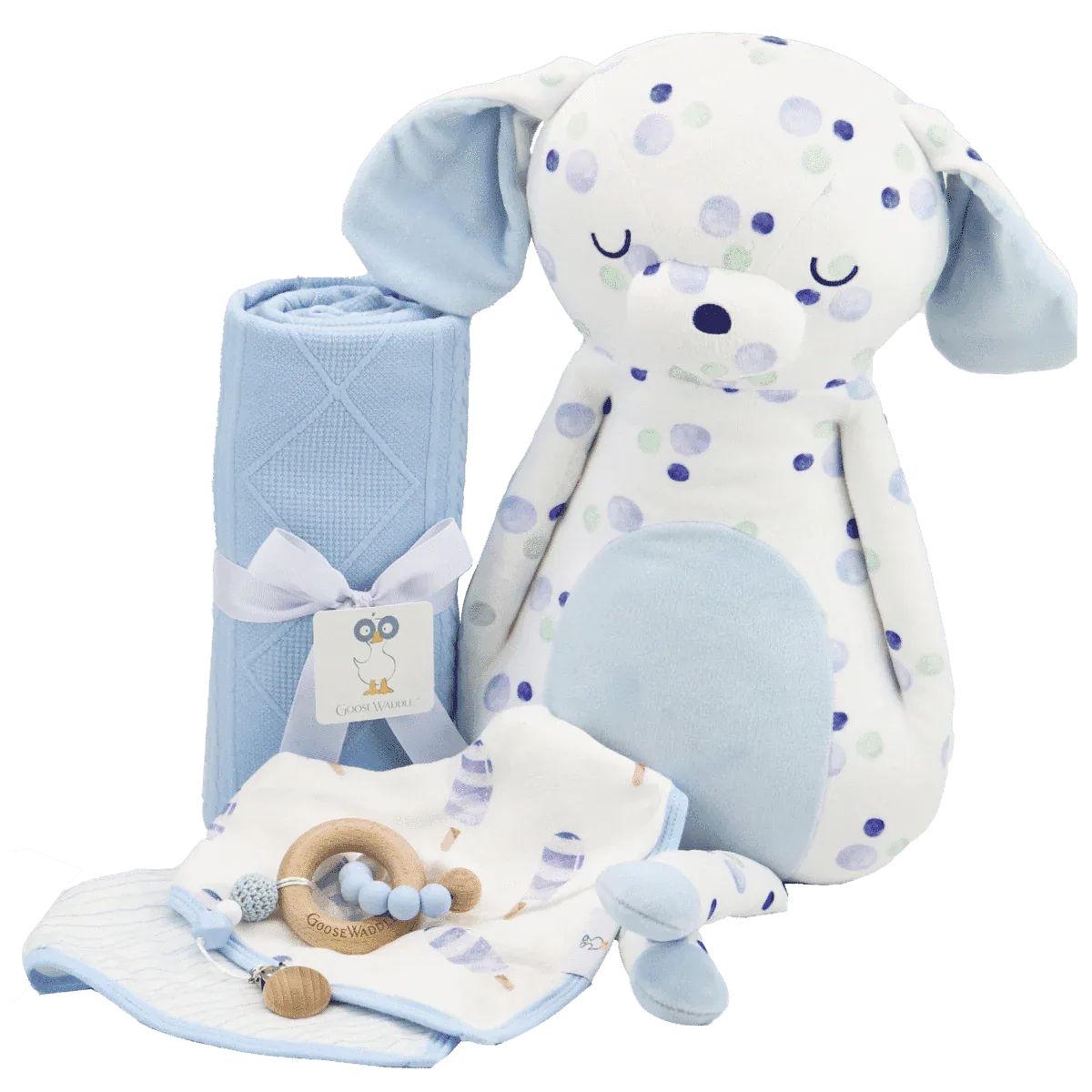 Rolled blue knit baby blanket with plush polka dot dog toy and baby teething accessories for newborns