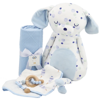 Rolled blue knit baby blanket with plush polka dot dog toy and baby teething accessories for newborns