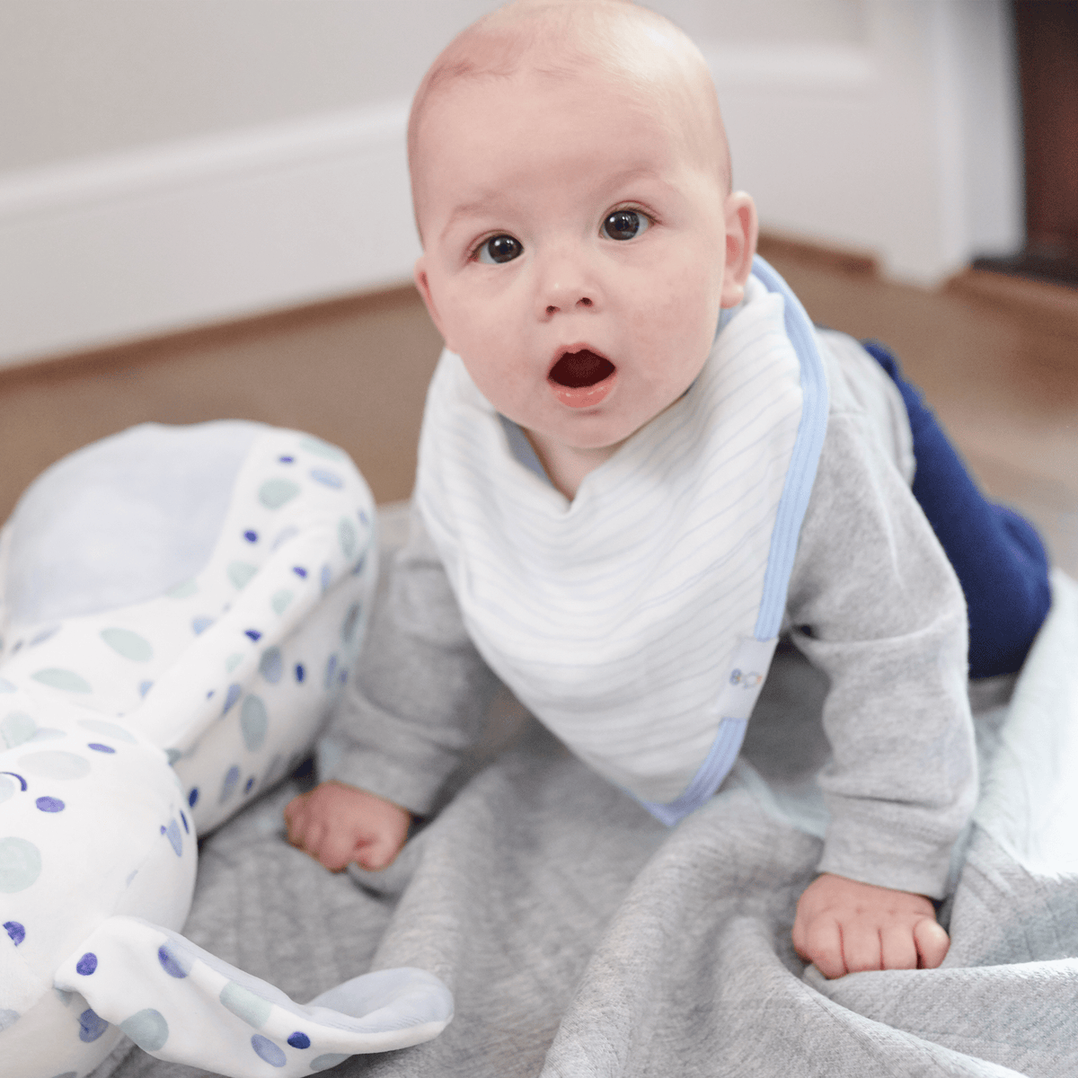 High-quality muslin and terry cloth materials used in the Popsicle and Stripes Blue 2 Pack Baby Cloth Bib Set, ensuring comfort for your baby.