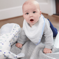 High-quality muslin and terry cloth materials used in the Popsicle and Stripes Blue 2 Pack Baby Cloth Bib Set, ensuring comfort for your baby.