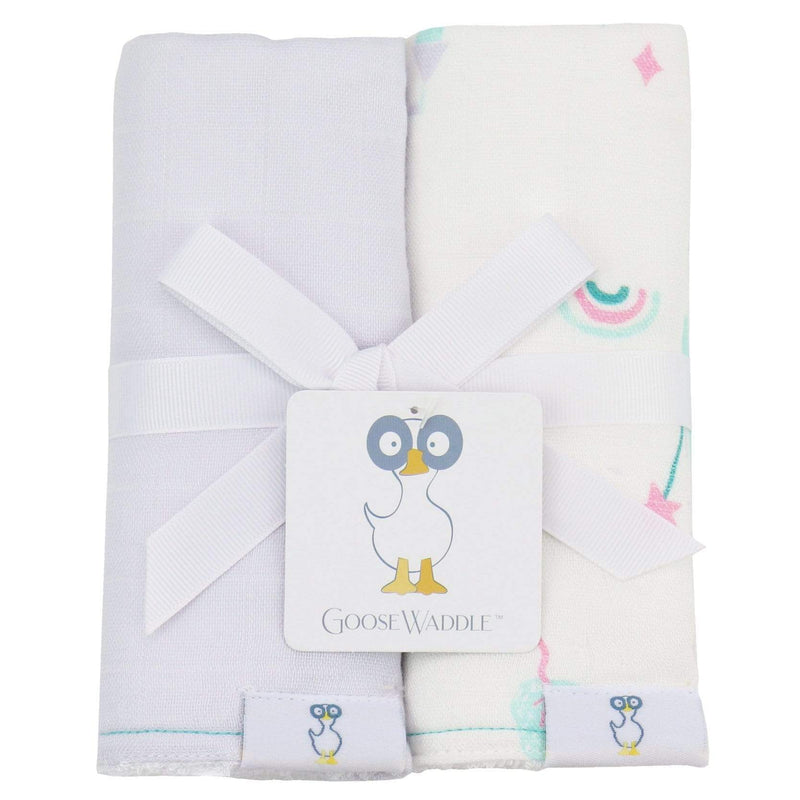Castles and Lavender 2 PK Muslin & Terry Cloth Burp Cloth set by Goosewaddle, featuring a soft gray cloth and a colorful patterned cloth tied together with a white ribbon, ideal for keeping your baby clean and stylish during feeding.