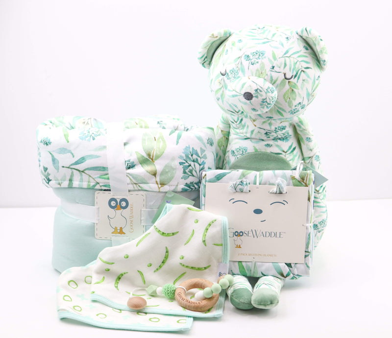 Complete baby gift set including the Basil Bear Mint Applique Baby Blanket, plush bear, and accessories in coordinating mint colors.