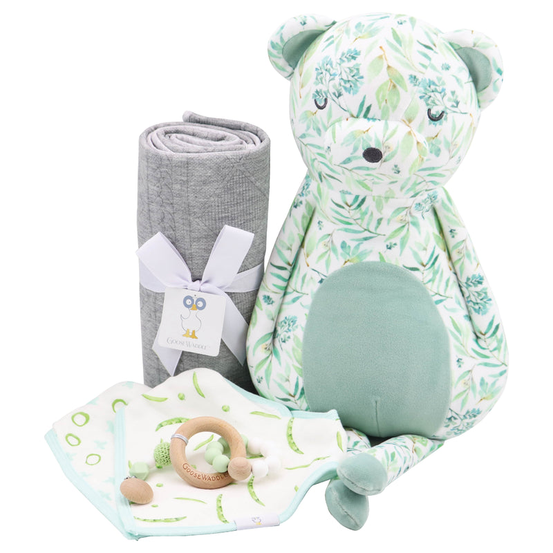 Super Soft Printed Plush 15" bear alongside a soft blanket and teething ring, perfect for newborns and toddlers.