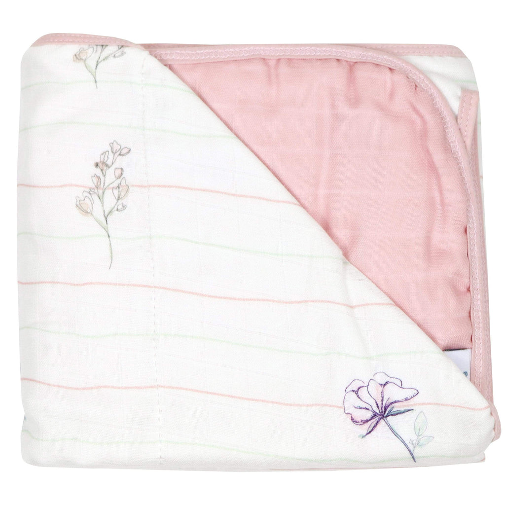 Flower and Pink Oversized Bamboo Muslin Quilted Blanket folded, showcasing its soft texture and charming floral design, perfect for newborns and nurseries.