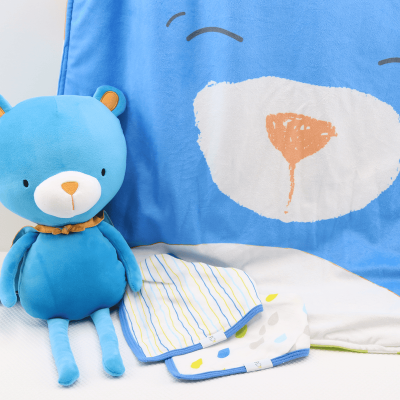 The Bear Stroller Blanket from Goosewaddle® paired with matching toys and bibs, highlighting its colorful and engaging style for baby's adventures.