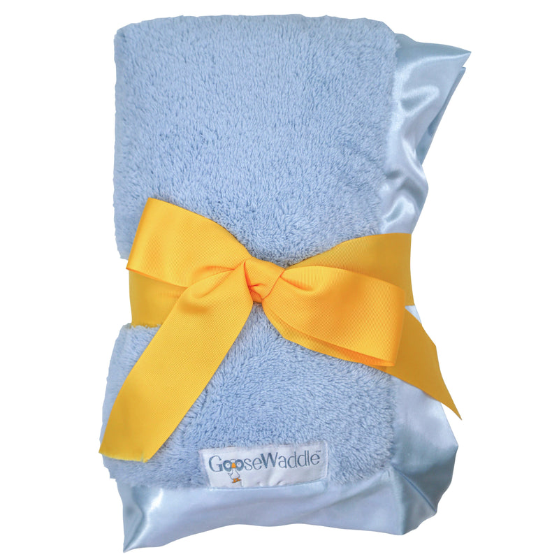 GooseWaddle Luxury Blanket in soft blue featuring a silky satin trim and a bright yellow bow, perfect for keeping your baby cozy.