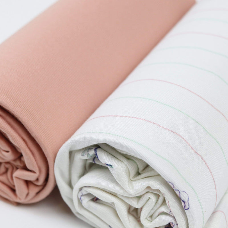Close-up of the Flower and Pink 2 PK Swaddle Blanket set, displaying the soft pink and white striped blanket, perfect for wrapping babies or as nursery decor.