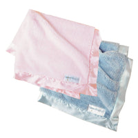 Pink and blue newborn baby blankets with luxury baby blanket satin trim folded neatly