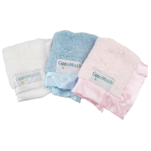 Goosewaddle luxury baby blankie with silk edges in white, blue, and pink soft plush material
