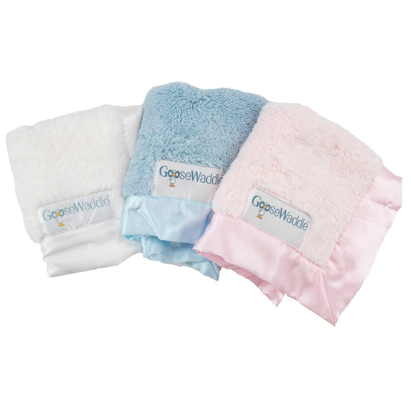 Goosewaddle luxury baby blankie with silk edges in white, blue, and pink soft plush material