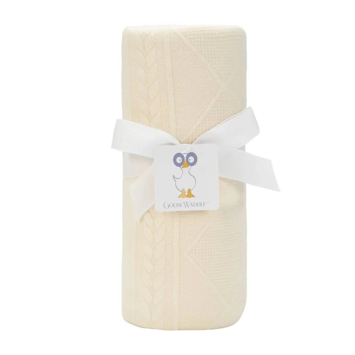 Oatmeal knit baby blanket rolled and tied with white ribbon for newborns