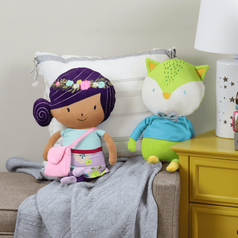 Parker the Woodland Princess Plush Doll sitting alongside a cute green fox plush toy on a cozy couch, showcasing the adorable woodland princess plush doll in a playful setting.