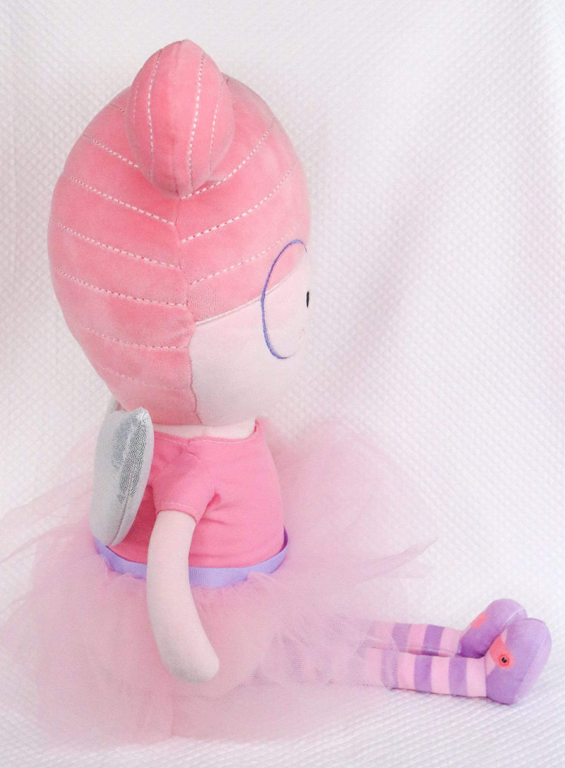 Side view of the Meg Fairy Plush Doll with Dress and Wings, showcasing its pink tutu and cute spiral hair design.
