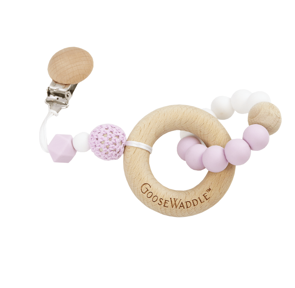 Goosewaddle silicone teether for newborns with pink and white beads and wooden ring with clip