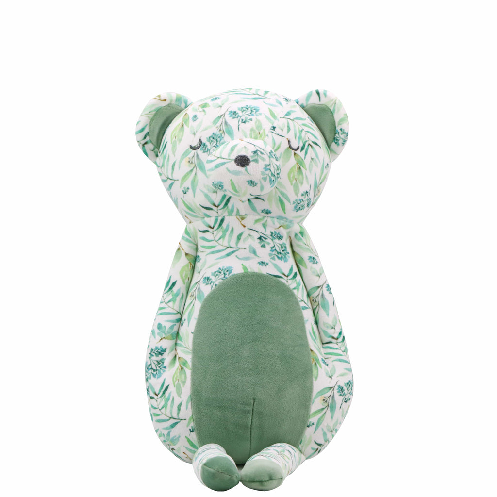 Basil Bear Mint Super Soft Plush sitting upright, showcasing enchanting mint colors and floral patterns, perfect for cuddles.
