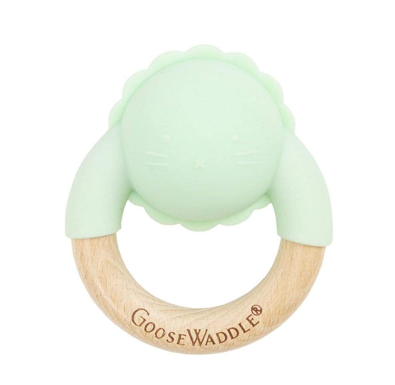 Green Rattle Teether Wooden + Silicone from Goosewaddle, shaped like a lion, perfect for little ones to soothe their gums during teething.