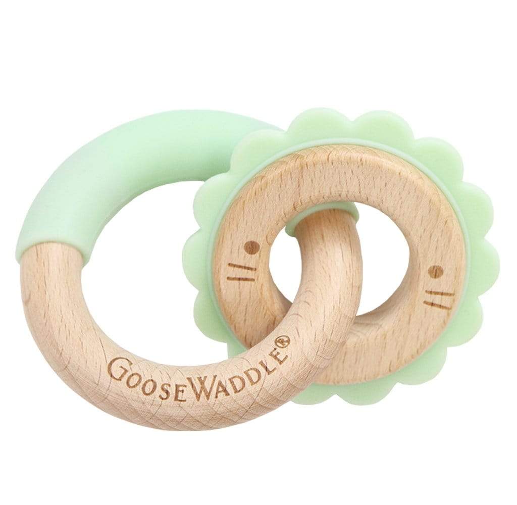 Mint Lion Silicone + Wood Double Teether ring featuring a natural wood base and soft mint silicone, perfect for soothing babies during teething.