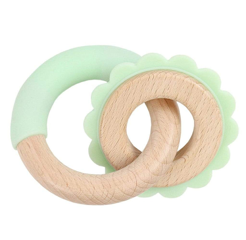 Mint Lion Silicone + Wood Double Teether, showcasing the combination of mint silicone and natural wood, designed for comfortable grip and teething relief.