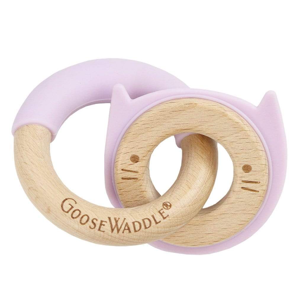 Lavender Kitten Silicone + Wood Double Teether featuring a playful design with soft lavender silicone and natural wood, ideal for soothing teething babies.