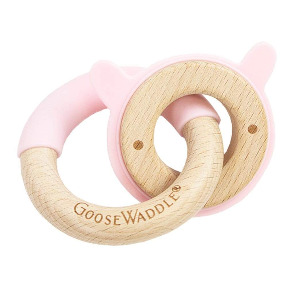 Pink Bunny Silicone + Wood Double Teether, featuring a soft pink silicone outer ring and a natural wood inner ring, designed for babies teething comfort.