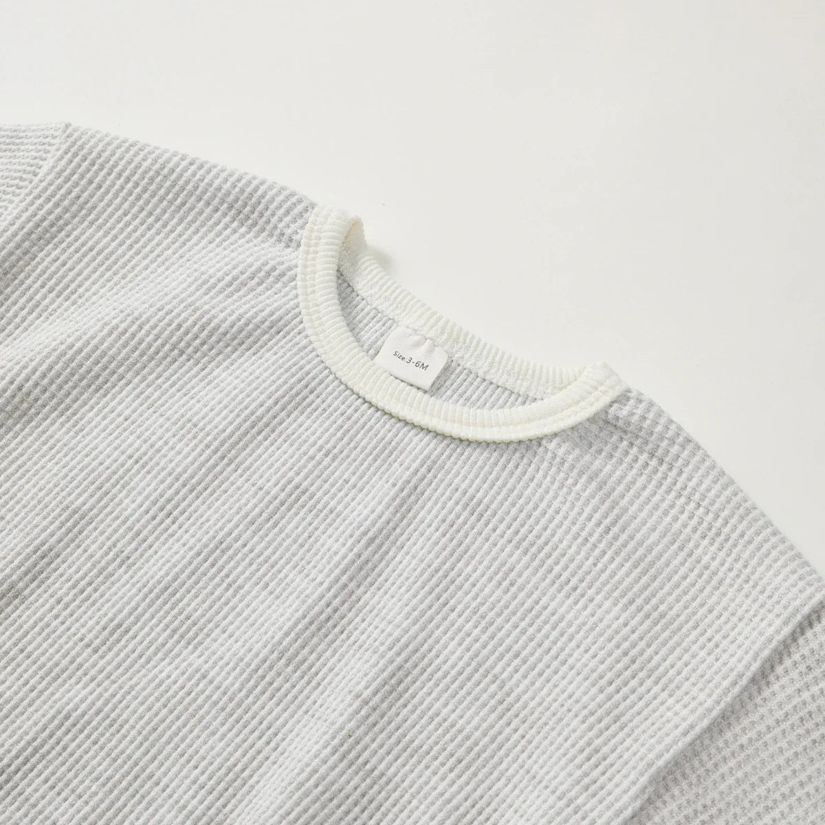baby gray waffle knit warm up outfit top with cream trim neckline, long sleeve