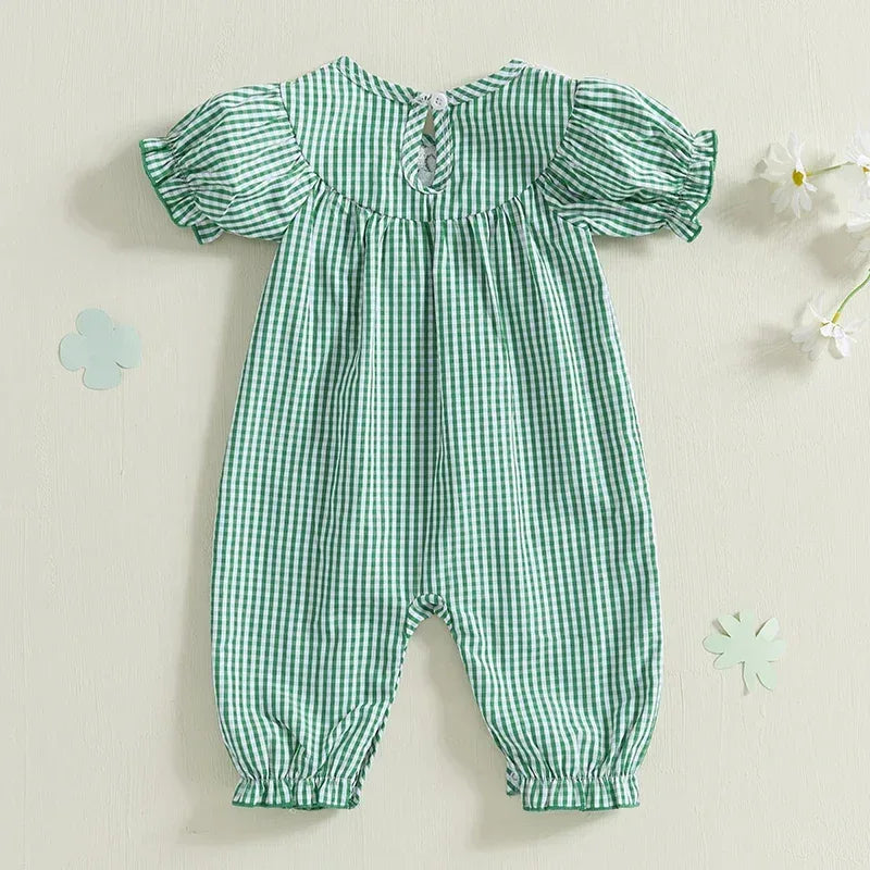 Green check smocked romper for babies made of soft cotton with puff sleeves and elastic cuffs