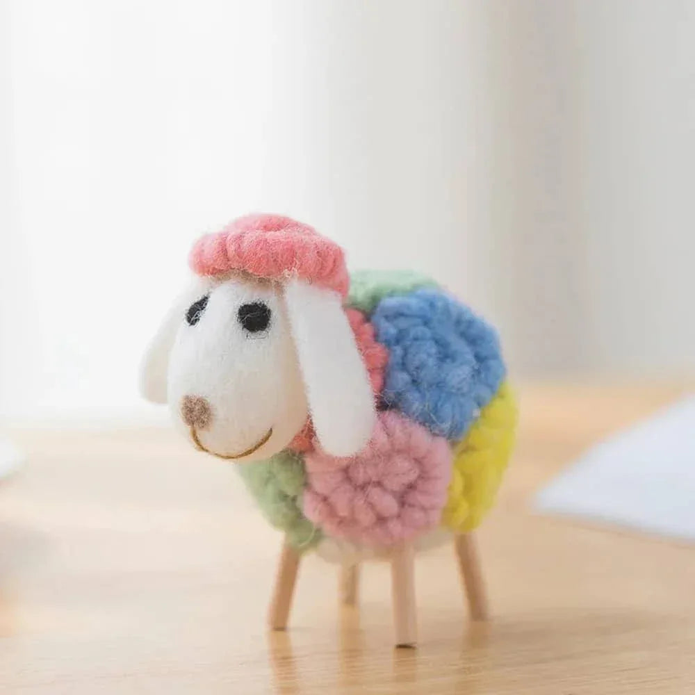 Colorful handmade sheep nursery decor for kids and babies with pink head and multicolor wool body