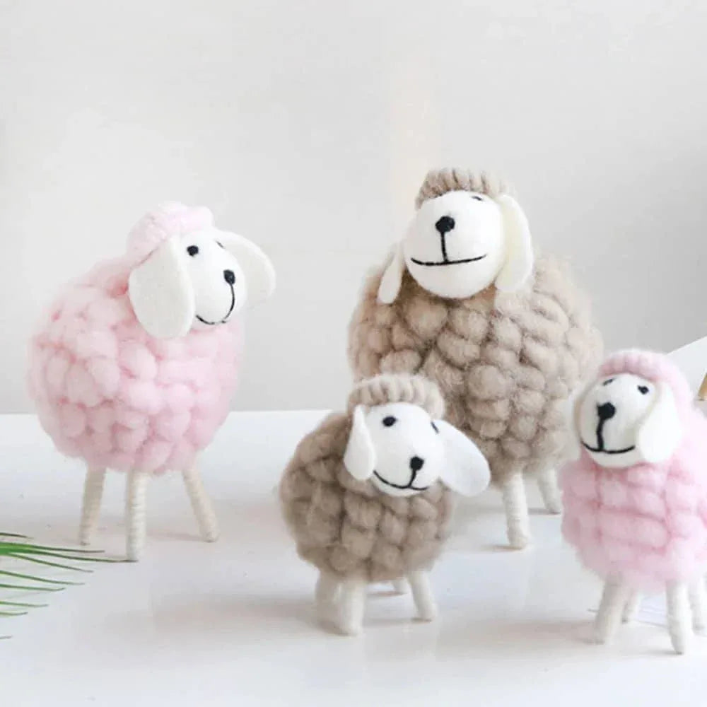 Handmade sheep nursery decor in pink and beige for kids and babies, soft textured wool design