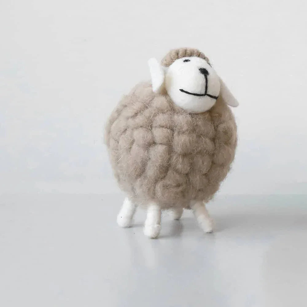 Handmade sheep nursery decor in light brown with white face and legs, soft wool texture for kids and babies