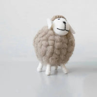 Handmade sheep nursery decor in light brown with white face and legs, soft wool texture for kids and babies