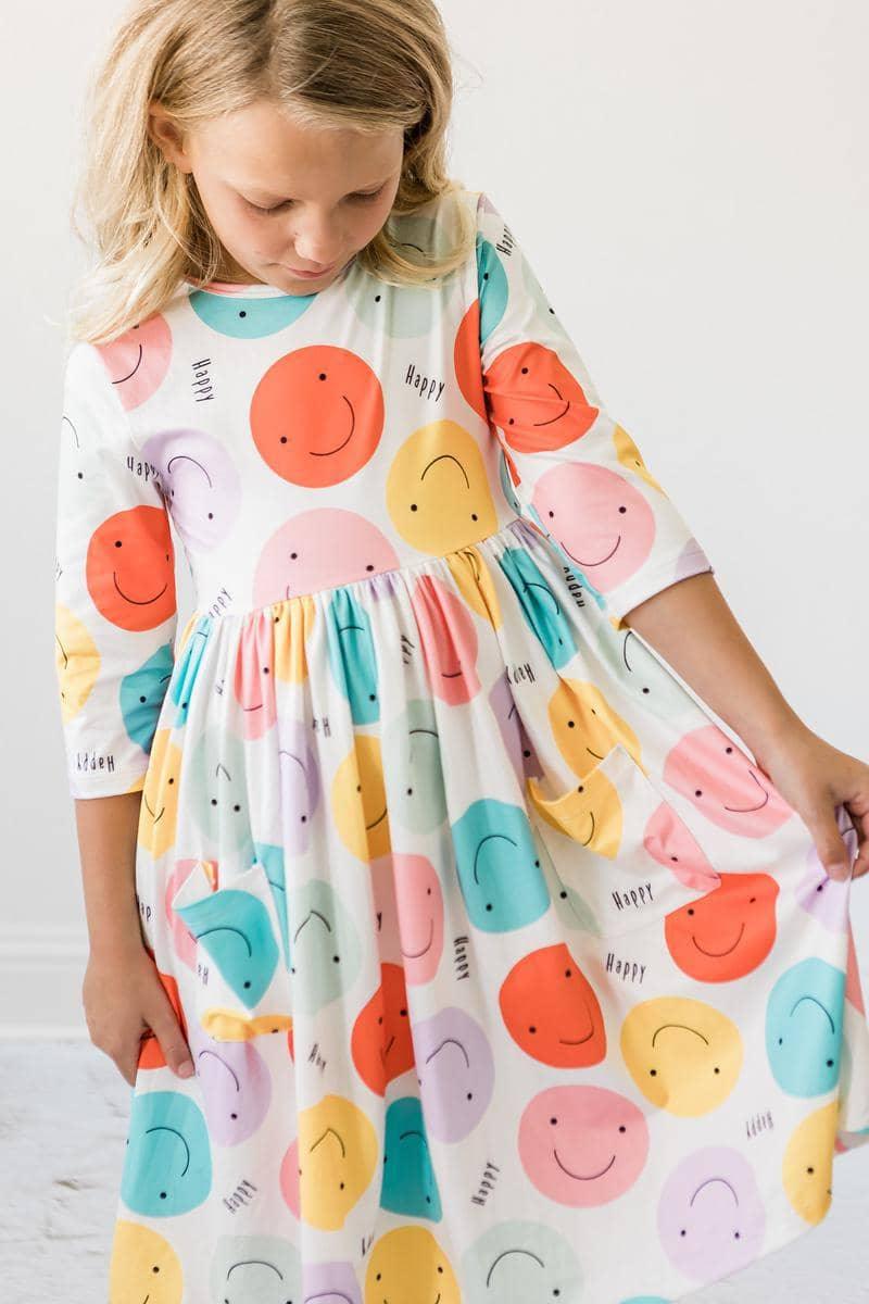 Girls white sleeve Twirl Pocket Dress with colorful happy face pocket twirl dress for girls print