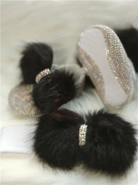 black fluffy headpiece set for babies with sparkling rhinestone accents and soft white band