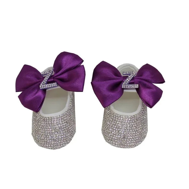 baby headpiece set for babies with silver glitter shoes and large purple satin bows for newborns