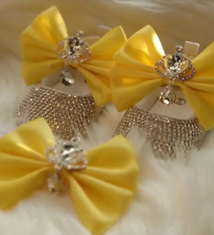 Yellow headpiece set for babies with decorative crowns and sparkling silver fringe accents