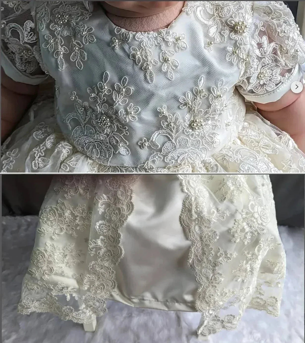 baby wearing ivory heirloom baby girl gown with lace and pearl details sitting down