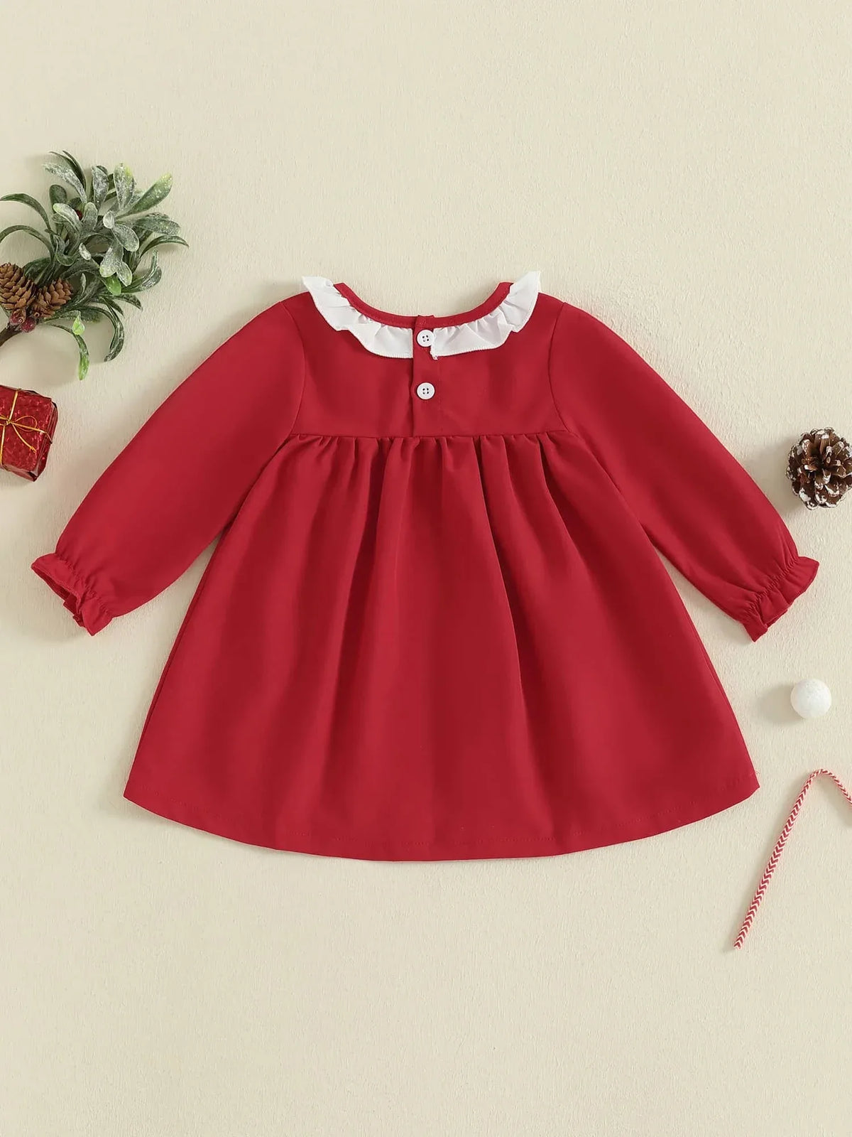 Red holiday baby dress with candy canes for infants with white ruffled collar and long sleeves